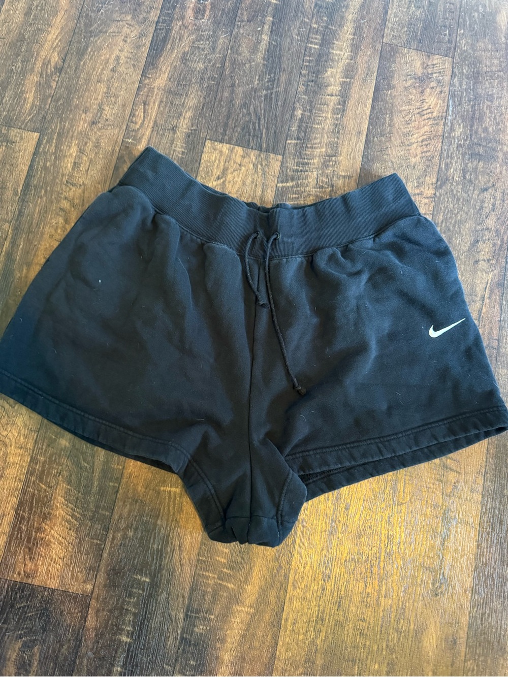 Nike Womens Black Athletic Shorts with White Swoosh
